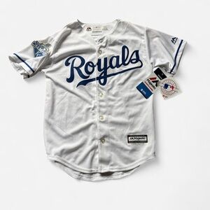 Majestic Kansas City Royals youth home jersey. 2015 World Series Champions patch